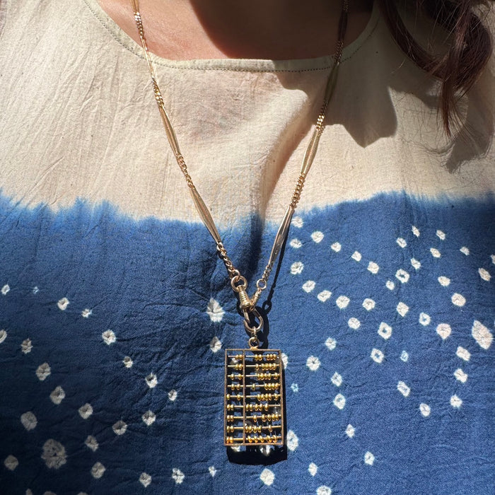 14k Articulated Abacus Charm
